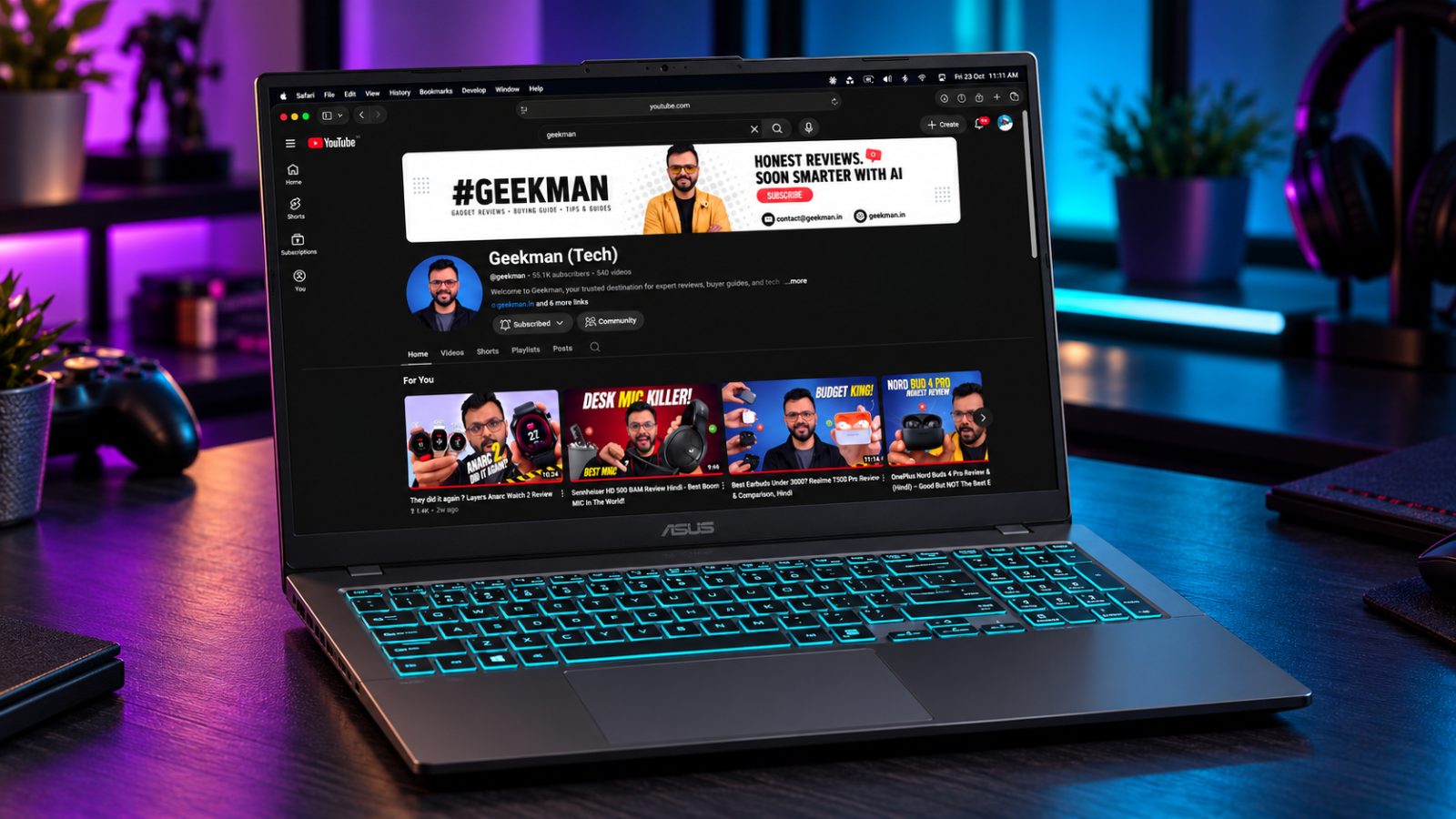 ASUS Gaming V16 2026 gaming laptop with RTX 4050 and Geekman YouTube channel banner on screen