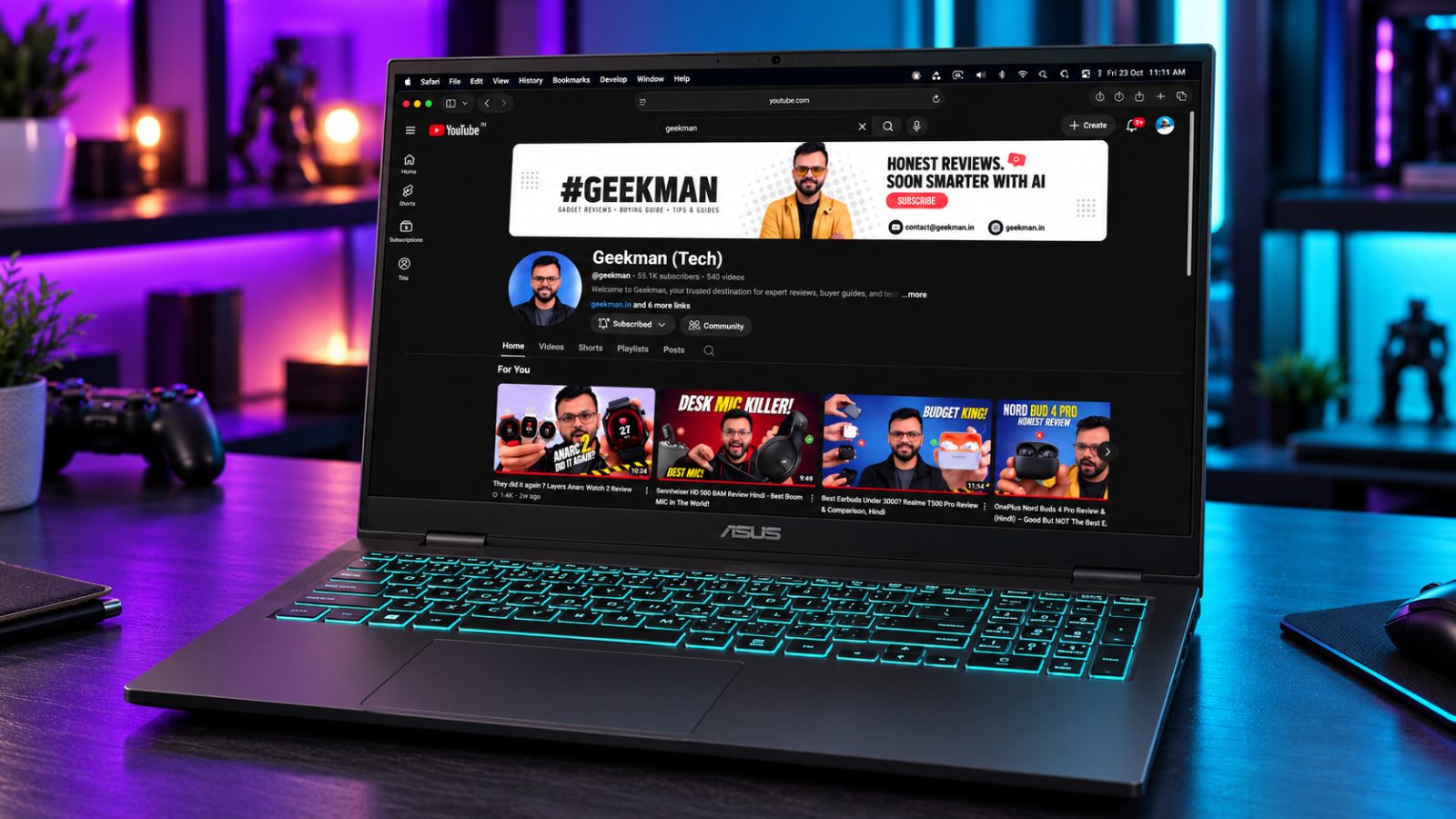 ASUS Gaming V16 2026 gaming laptop with RTX 5050 and Geekman YouTube channel banner on screen