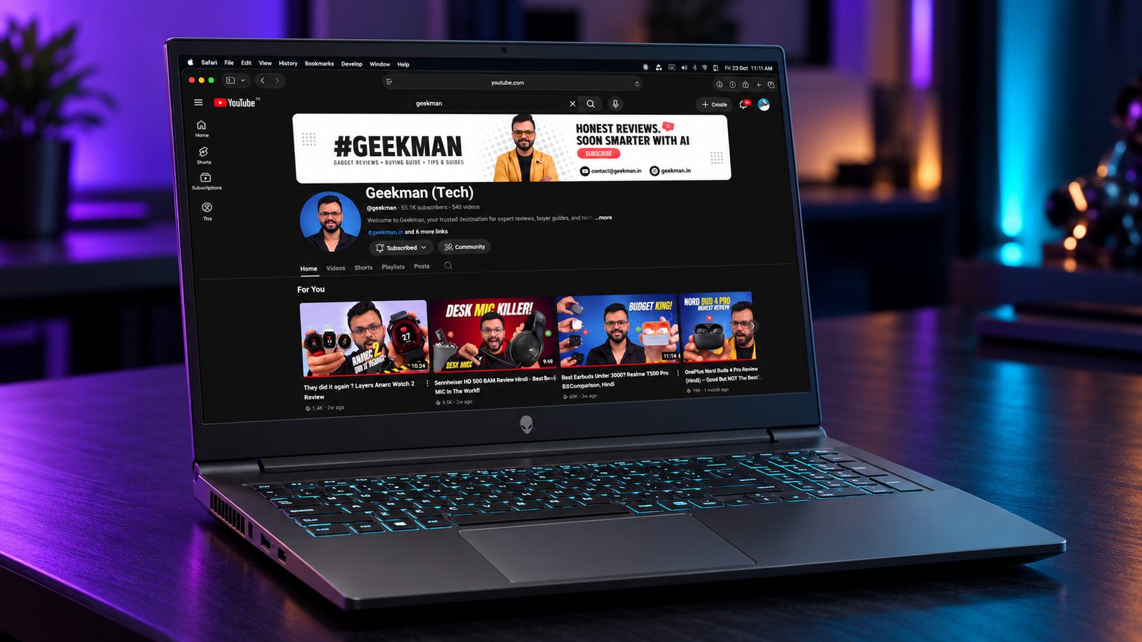 Alienware 15 Ryzen 7 260 RTX 5050 gaming laptop with Geekman YouTube channel banner on screen