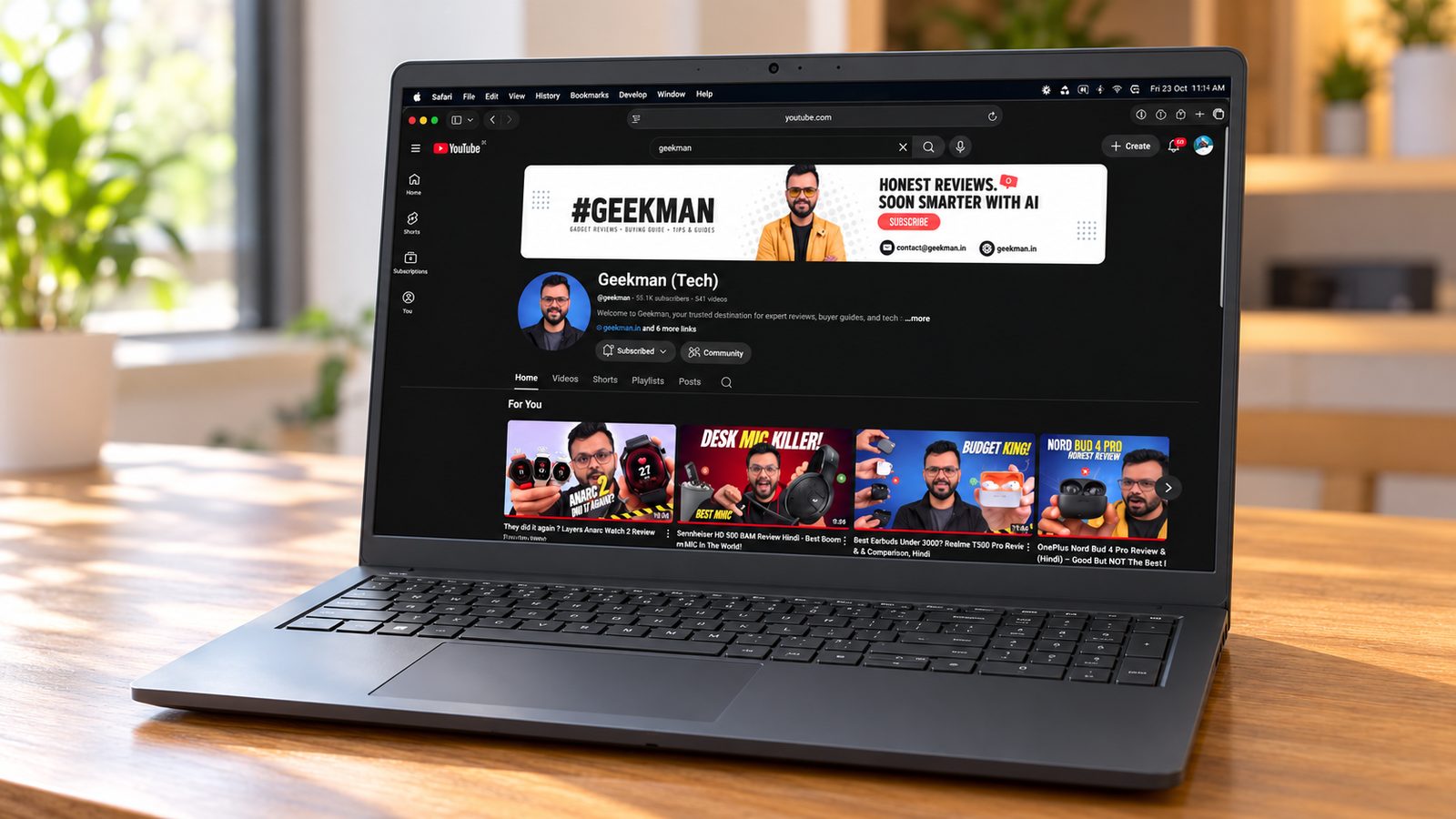Dell Pro 15 Ryzen 5 7520U laptop with Geekman YouTube channel banner on screen