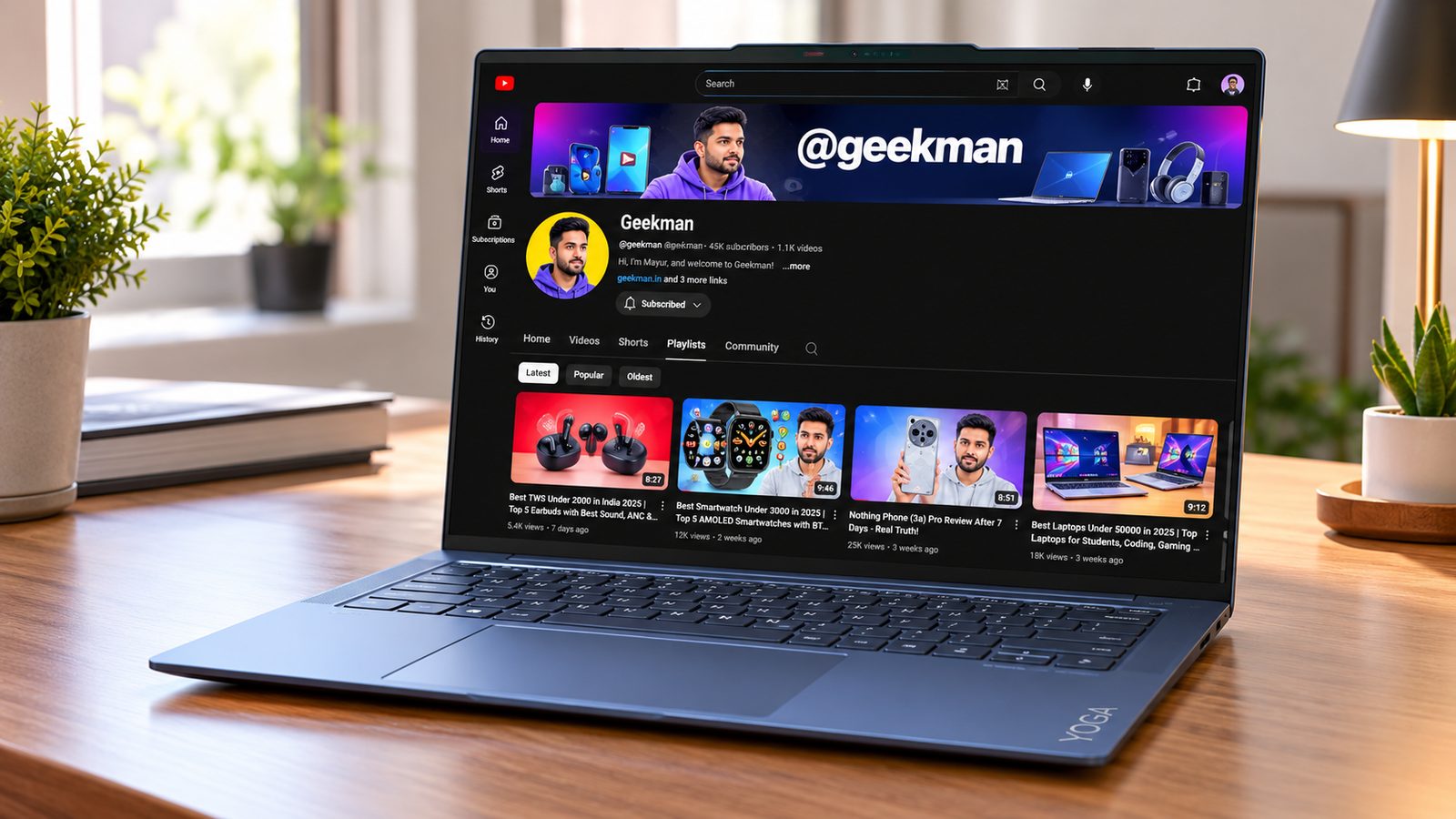 Lenovo Yoga Slim 7 Aura Edition OLED laptop with Geekman YouTube channel banner on screen