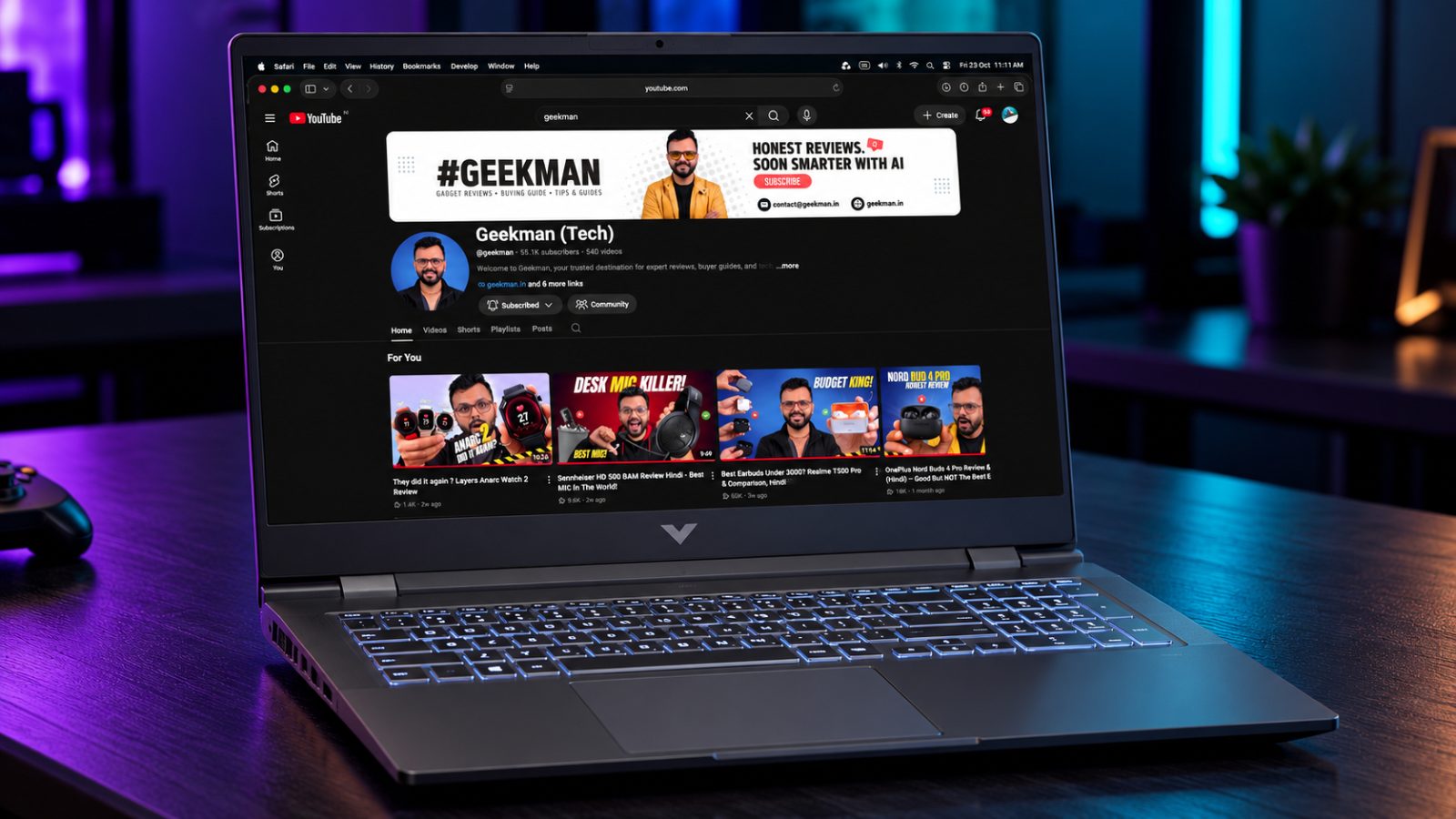 HP Victus 15 Ryzen 7 260 RTX 5050 gaming laptop with Geekman YouTube channel banner on screen