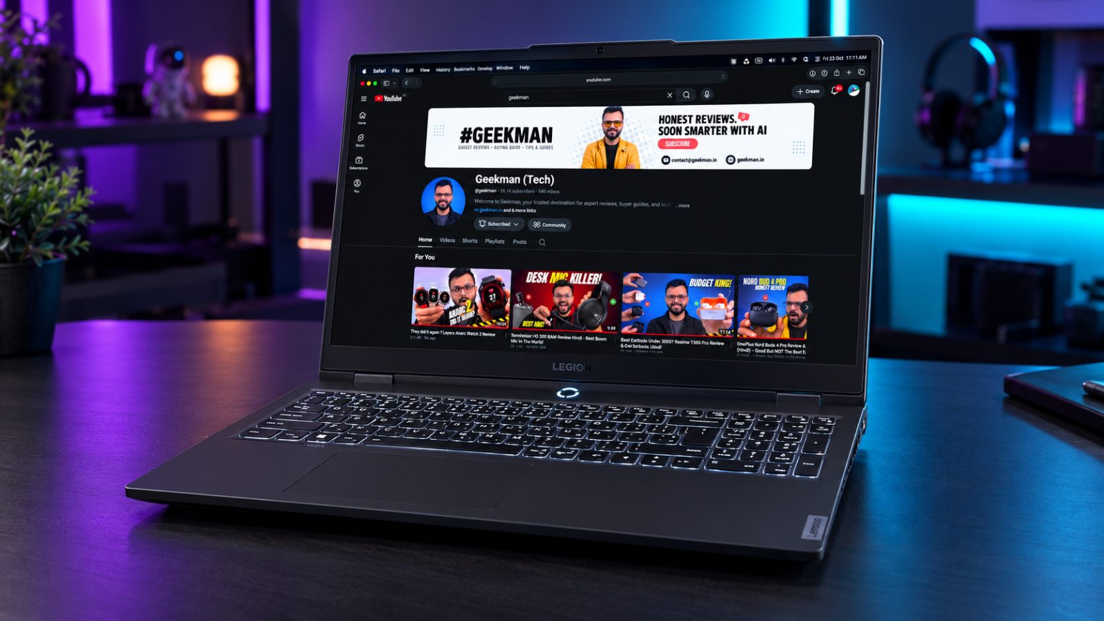 Lenovo Legion 5 2025 gaming laptop with RTX 5050 and Geekman YouTube channel banner on screen