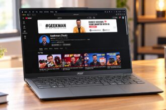 Acer Swift Neo laptop on a wooden desk with the Geekman channel on screen