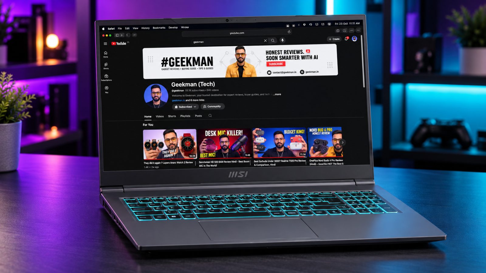 MSI Thin 15 B13UDX gaming laptop with Geekman YouTube channel banner on screen