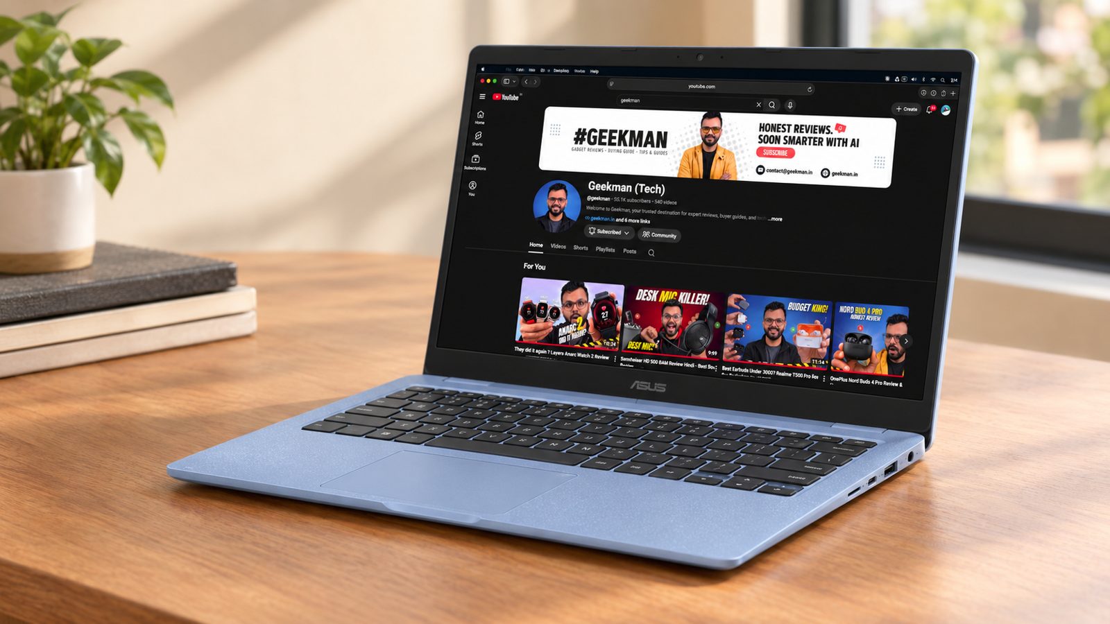 ASUS Chromebook CM1505 on a wooden desk