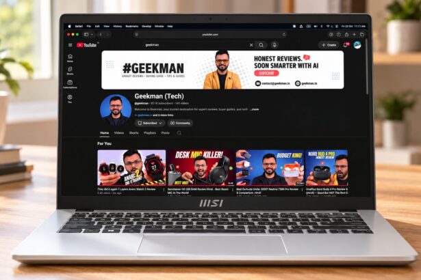 MSI Modern 14 laptop on a desk showing the Geekman channel