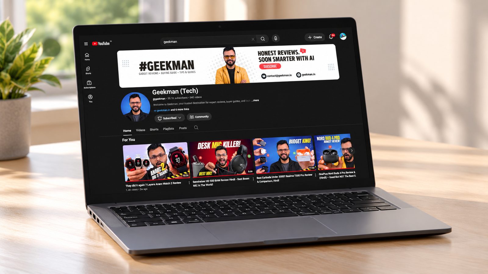 Samsung Galaxy Book4 Core i5 laptop on a desk showing the Geekman channel