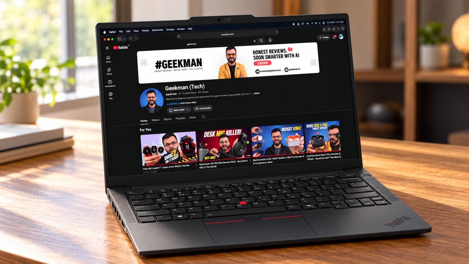 Lenovo ThinkPad E14 laptop on a wooden desk